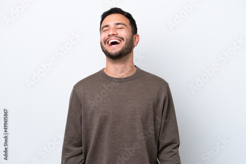 Obraz na plátne Young Brazilian man isolated on white background laughing