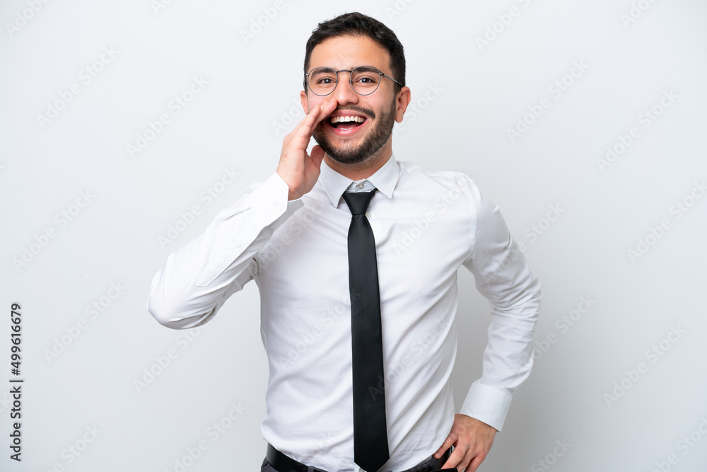 Business Brazilian man isolated on white background shouting with mouth wide open Business Brazilian man isolated on white background shouting with mouth wide open