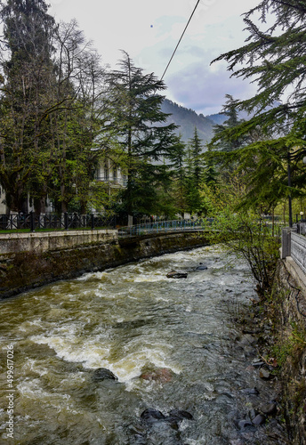 View from the bridge on the river of the resort town of Borjomi in Central Georgia. April 30, 2019.