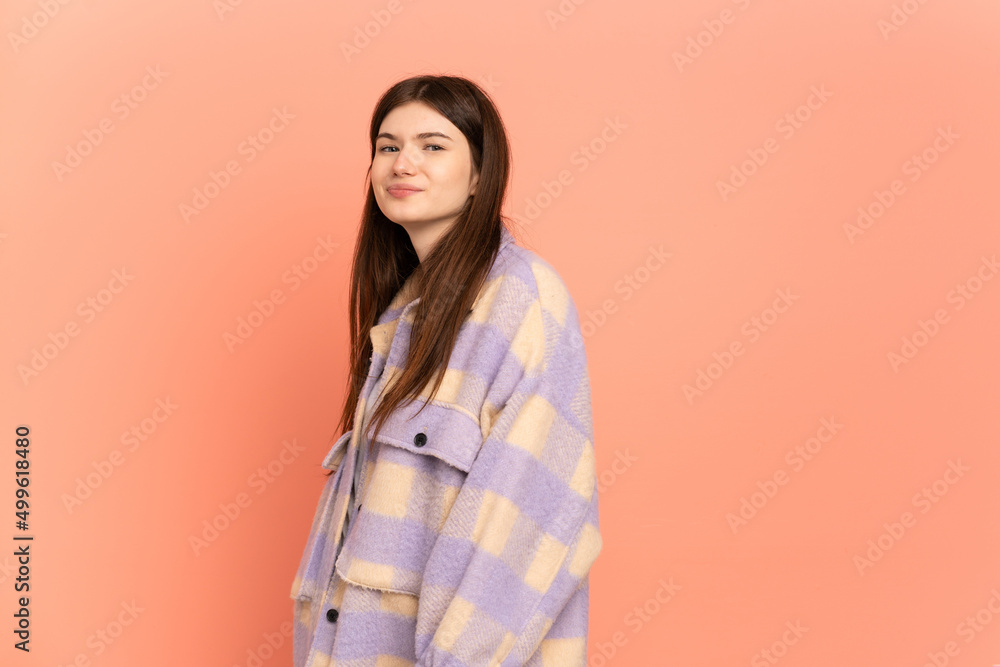 Young Ukrainian girl isolated on pink background . Portrait Young Ukrainian girl isolated on pink background . Portrait