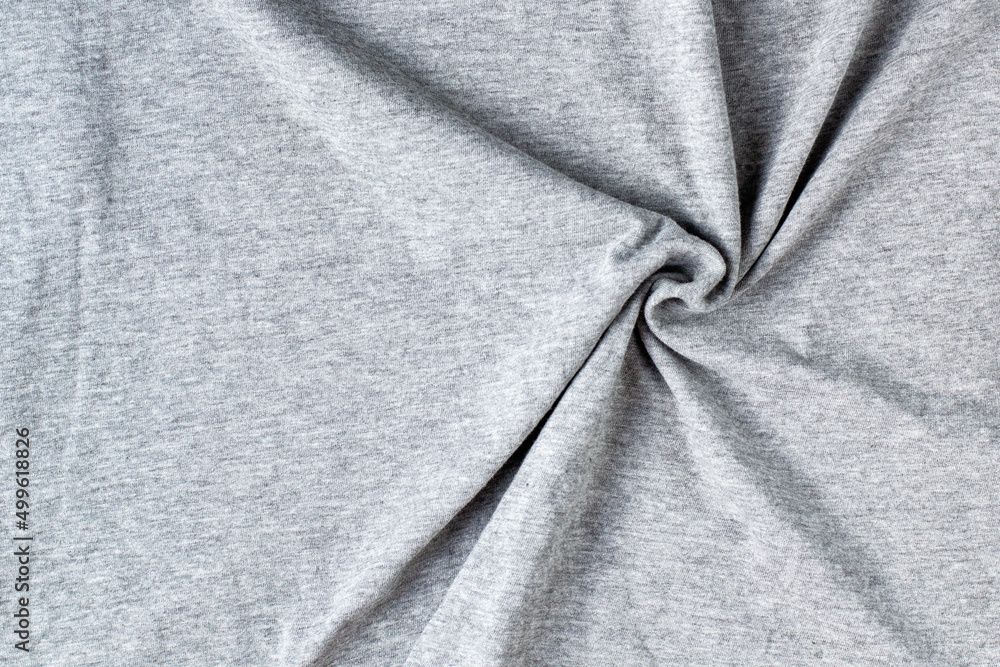 Fototapeta premium Grey crumpled fabric background for your design. Knitwear cotton abstract texture