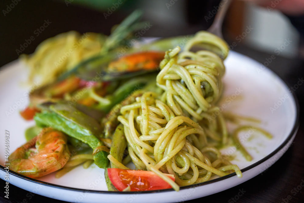 A delicious and delicious western food, seafood pasta with avocado green sauce A delicious and delicious western food, seafood pasta with avocado green sauce