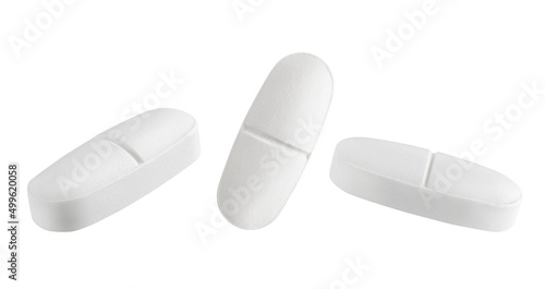 Set of white pills isolated on white background