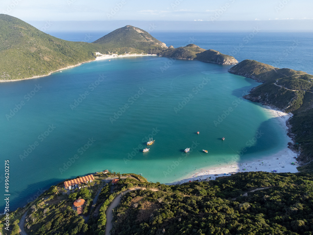 the most beautiful paradise bay with turquoise water beaches in the world. Caribbean and Thai style. Aerial drone cinematic view. Arraial do Cabo, Rio de Janeiro, Brazil - Praia do Pontal do Atalaia a