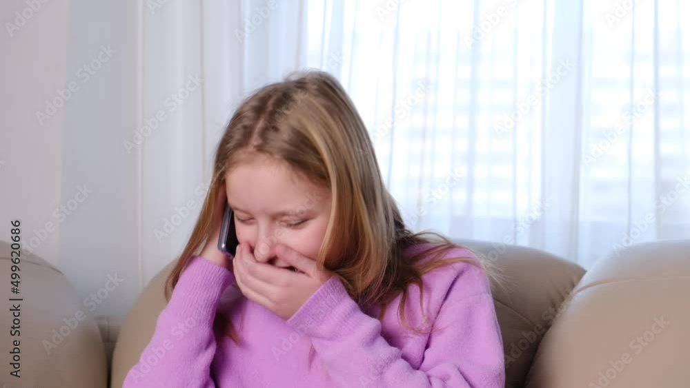 Girl talking to phone and laughing