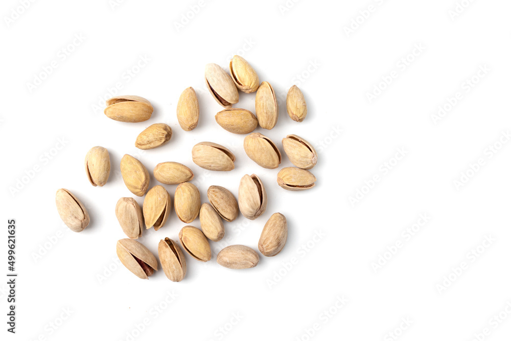 heap of unpeeled almonds isolated on white background heap of unpeeled almonds isolated on white background