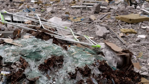 Chernihiv Ukraine 2022: A destroyed building after air attack. Result of rocket or artillery shelling   residential buildings by Russian Federation army.
Ruins during War of Russia against Ukraine. photo