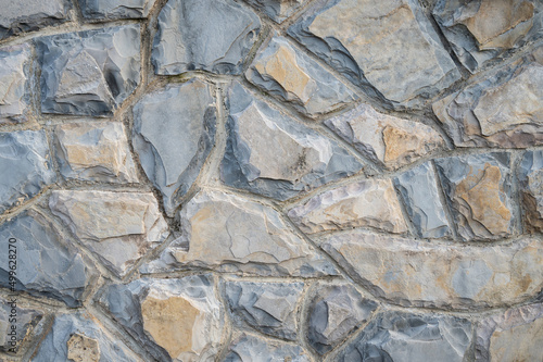 Blue and grey stones wall texture
