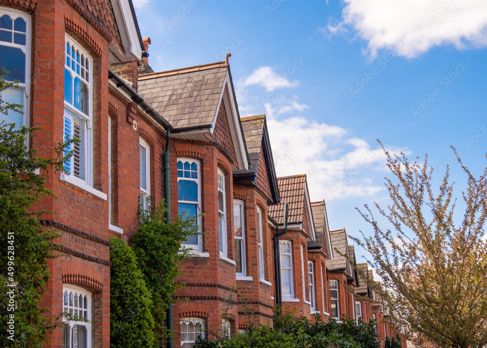 Fototapeta premium Typical British red brick terraced houses in West London