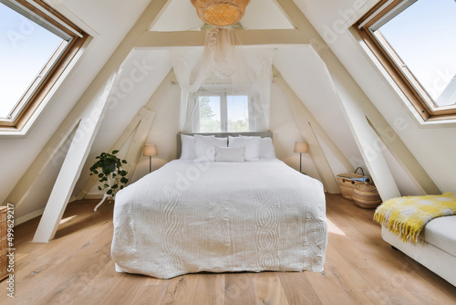 Bedroom with double bed on the roof of the house