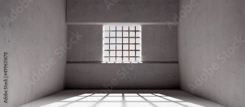 Tableau sur toile Empty jail with a window and prison bars, concrete walls and floor, dungeon interior