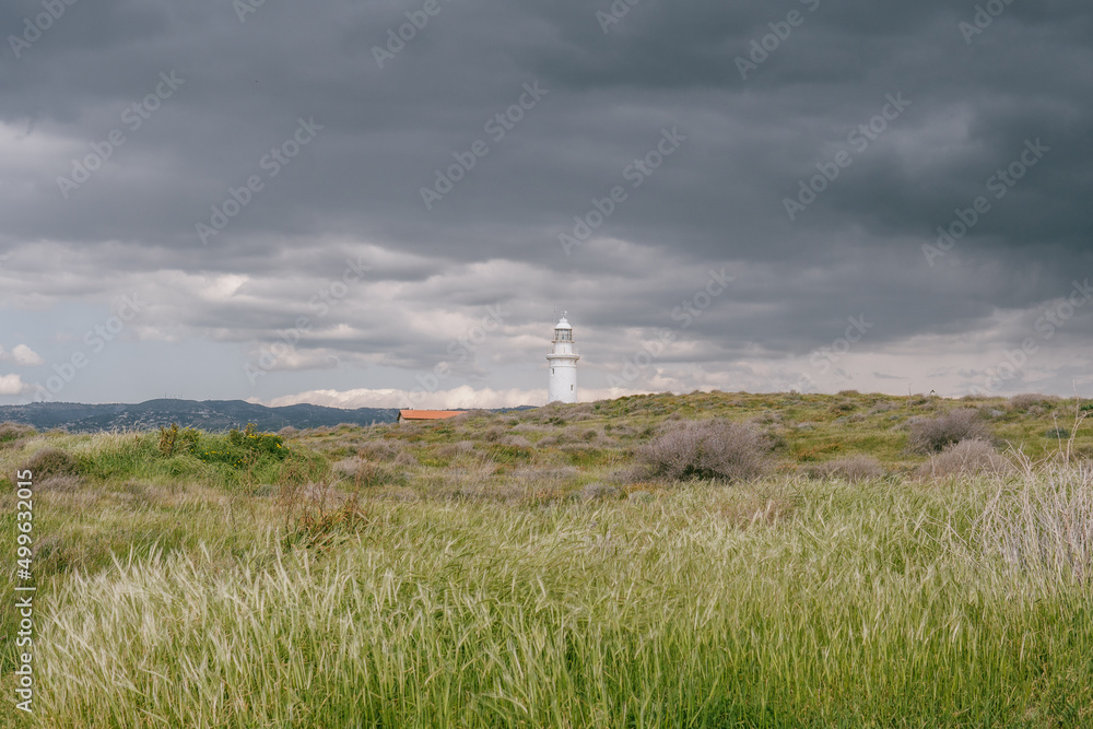 Cyprus - Archaeological Site of near Paphos with an lighthouse from drone view, Archaeological Park of UNESCO