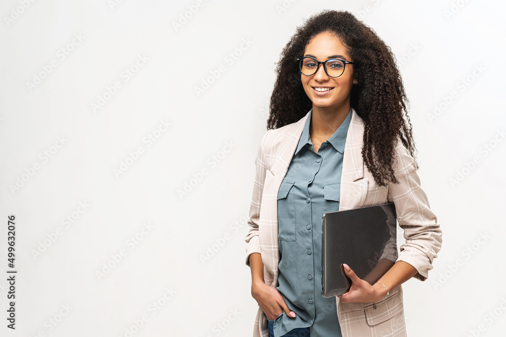 Young African American woman with afro hairstyle wearing smart