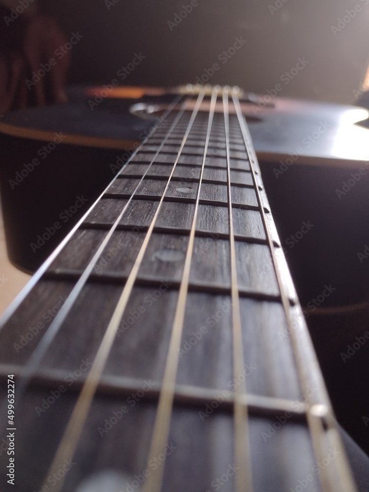 close up of a guitar close up of a guitar