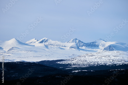 Rondane Mountains in Rondane National Park, Oppland, Norway, covered with snow. photo