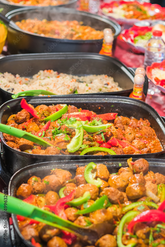 Meatballs curry served with rice at Brick Lane market in London