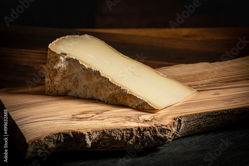 Chebris Cheese on a Wooden Cutting Board
