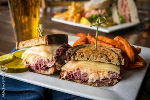 Close Up of Reuben Sandwich with Sweet Potato French Fries