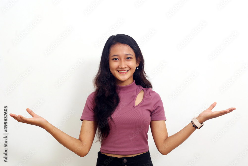 Asian girl showing with two hands empty. Isolated on white background Asian girl showing with two hands empty. Isolated on white background