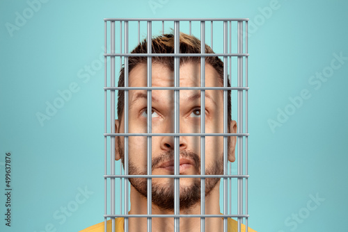 Canvas Print Head of a businessman in a cage