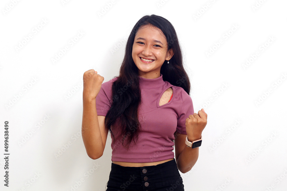 Photo portrait young girl overjoyed dancing wearing casual clothes. Isolated on white background Photo portrait young girl overjoyed dancing wearing casual clothes. Isolated on white background