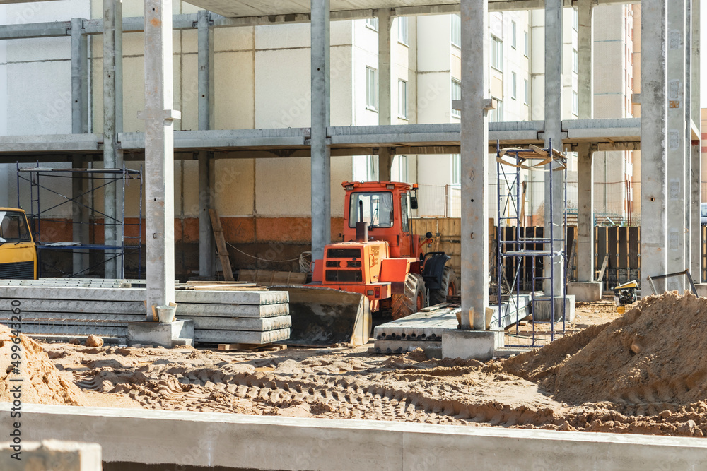 Concrete well rings and slabs at construction site. Concrete well rings and slabs at construction site.
