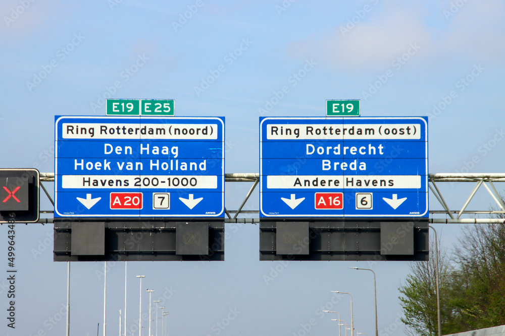 Blue Direction sign for the directions on Motorway A20 for directions A16 Dordrecht and A20 Hoek van Holland and The Hague.