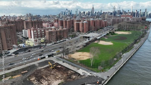 aerial cars driving on FDR Drive Manhattan skyline and LES projects in NYC photo