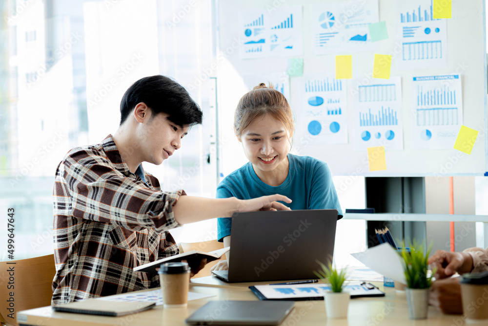 Working atmosphere in a start-up company, a female employee is discussing with executives on a marketing plan, marketing analysis to plan the company to grow by the mindset of the new generation. Working atmosphere in a start-up company, a female employee is discussing with executives on a marketing plan, marketing analysis to plan the company to grow by the mindset of the new generation.