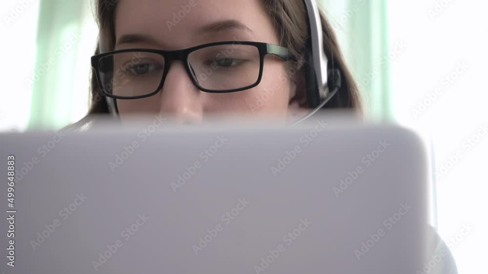 Close-up girl call center operator sells services. Call center. Close-up girl call center operator sells services. Call center.