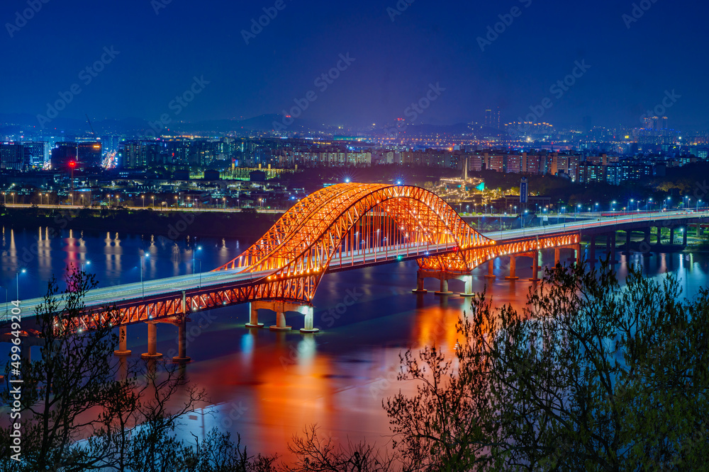 Bridge of Seoul Banghwa bridge beautiful Han river at night, Seoul, South Korea.
