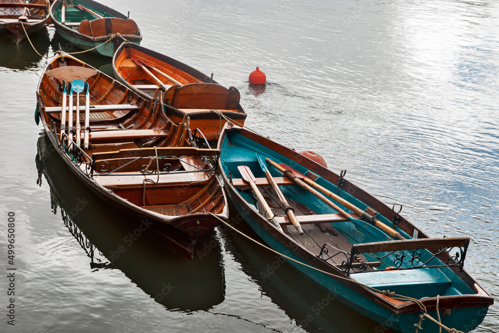 Punt flat bottom river wooden boats on river Thames waters in Richmond, London
