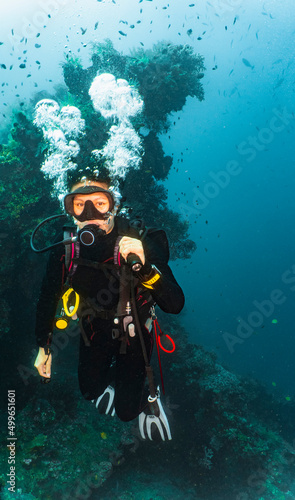 Wallpaper Mural diver exploring the wreck of the USS Liberty of the coast of Bali Torontodigital.ca