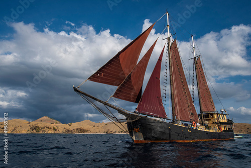 sailboat in the waters around Komodo island photo