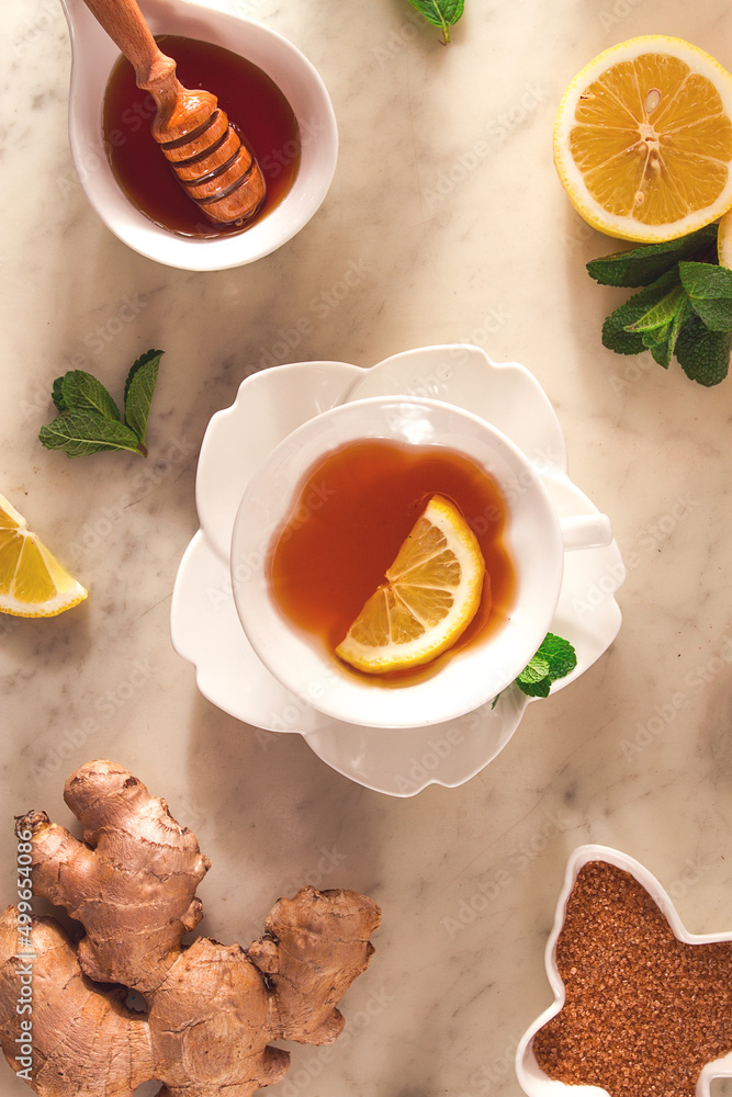 Ginger tea, with lemon, mint and honey, on a marble table, top view, sunlight, no people, selective focus, Ginger tea, with lemon, mint and honey, on a marble table, top view, sunlight, no people, selective focus,