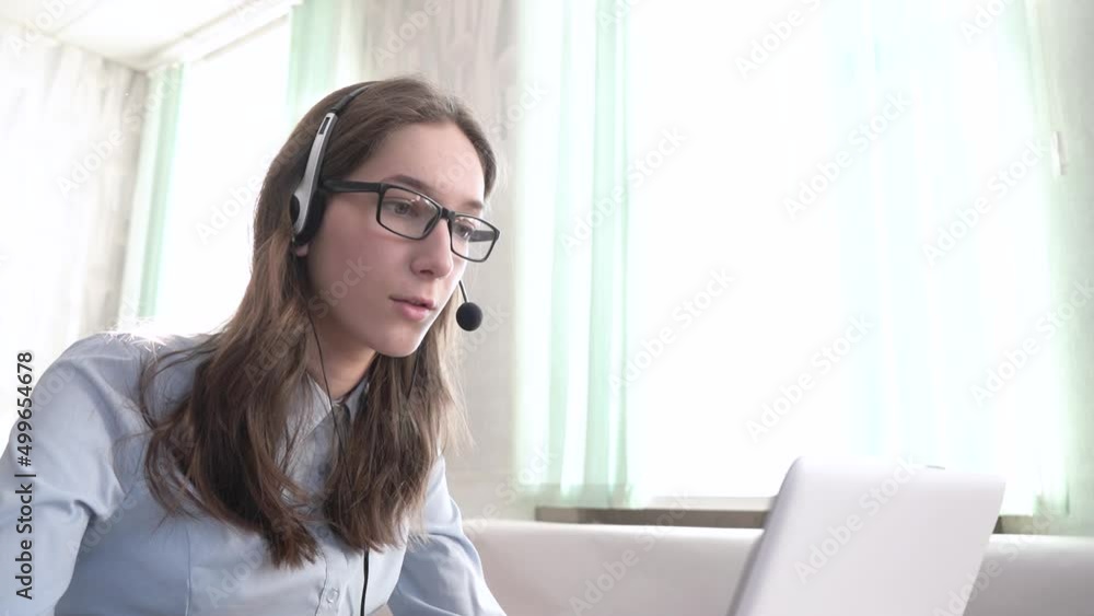 Close-up girl call center operator sells services. Call center. Close-up girl call center operator sells services. Call center.