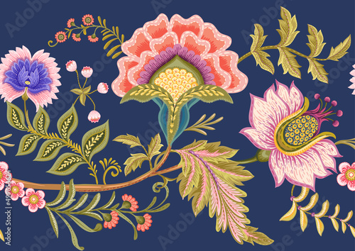 Fantasy flowers in retro, vintage, jacobean embroidery style. Border line seamless pattern on denim blue background. Vector illustration.