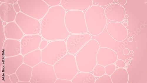 Transparent liquid flows between different sized white soap bubbles disconnecting them on pale pink background | Macro shot of foam cleanser ingredients