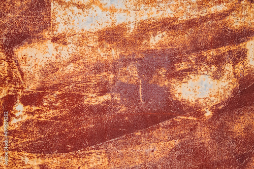 Metal surface covered with red rust background.