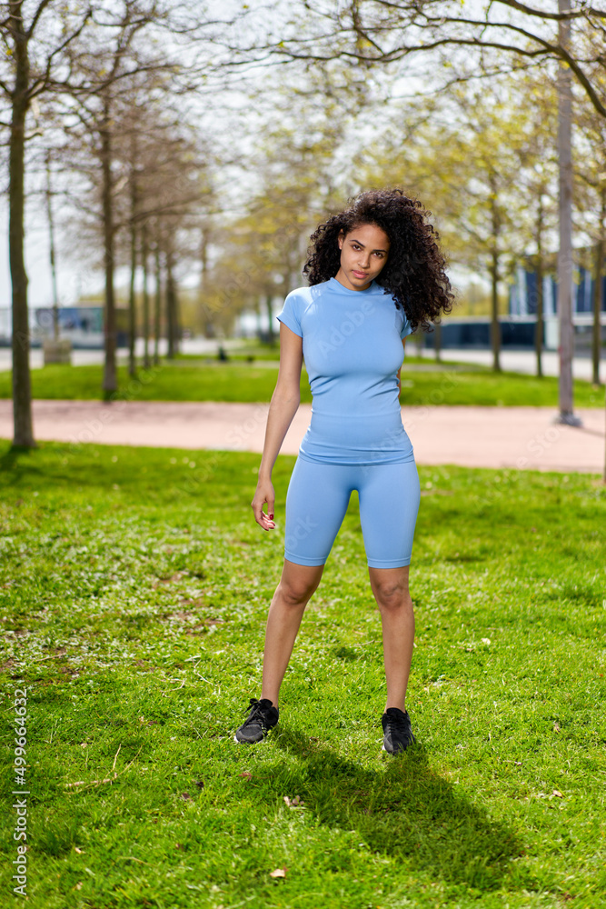 afro girl blue sportswear on sports in the park afro girl blue sportswear on sports in the park