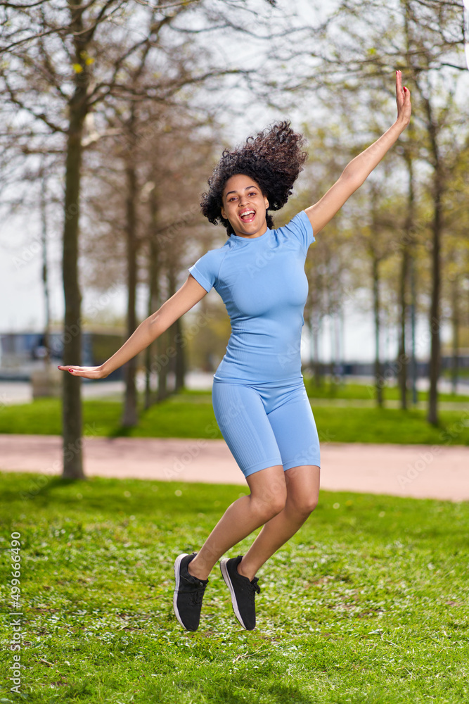 girl in sportswear goes in for sports at the park girl in sportswear goes in for sports at the park