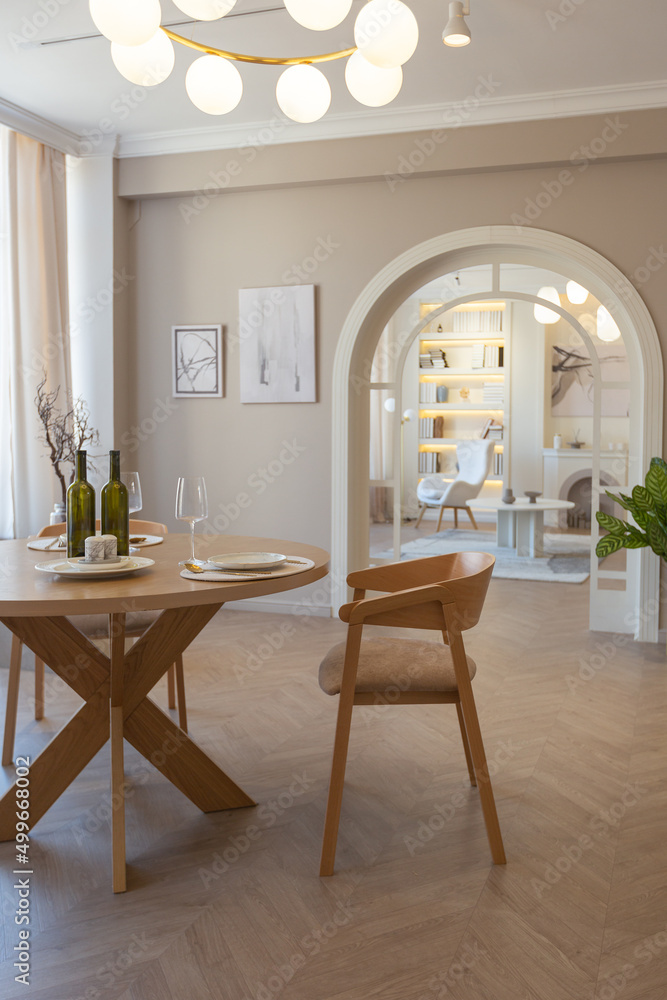 fashionable modern design luxury apartment in light colors. bright day behind huge windows. stylish decoration and no one inside. fashionable modern design luxury apartment in light colors. bright day behind huge windows. stylish decoration and no one inside.