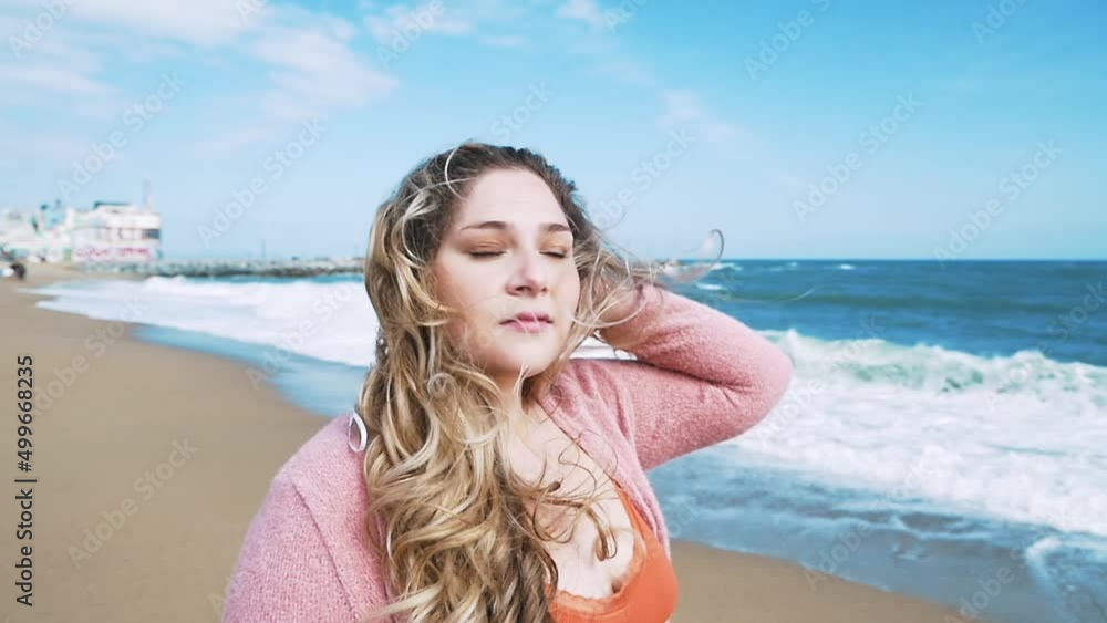 Beautiful curvy woman having fun outdoor on a beautiful day in Los Angeles, California. Body positive and self acceptance representation concepts Beautiful curvy woman having fun outdoor on a beautiful day in Los Angeles, California. Body positive and self acceptance representation concepts