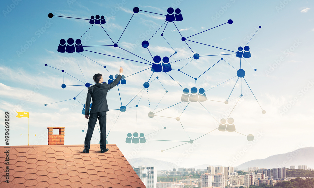 Businessman on house roof presenting networking and connection c Businessman on house roof presenting networking and connection c