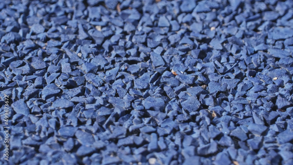 Rough Blue Shock Absorbing Synthetic Rubber Surface used as Safe Paving for Modern Playground Rough Blue Shock Absorbing Synthetic Rubber Surface used as Safe Paving for Modern Playground