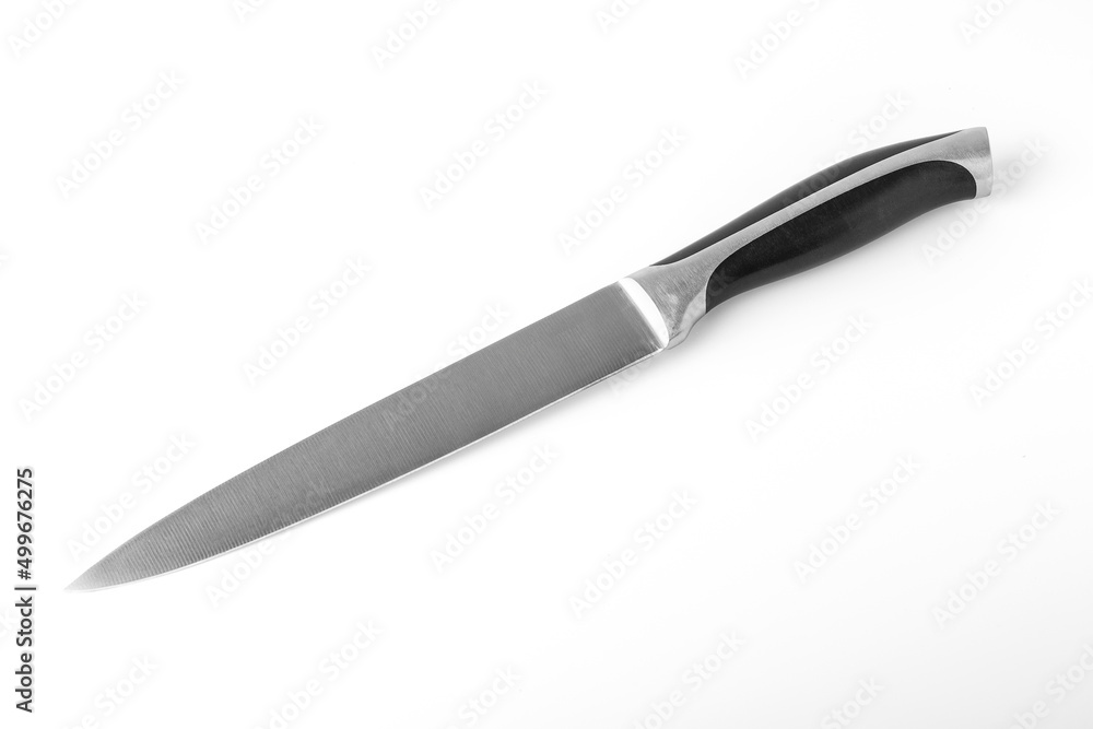 Table knife from stainless steel on a white background. Close-up Table knife from stainless steel on a white background. Close-up
