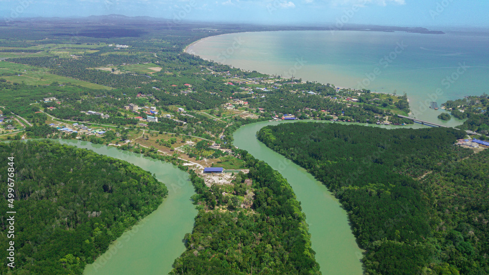 Aerial drone view of a river with mangrove swamp in Sedili Kecil, Johor, Malaysia Aerial drone view of a river with mangrove swamp in Sedili Kecil, Johor, Malaysia