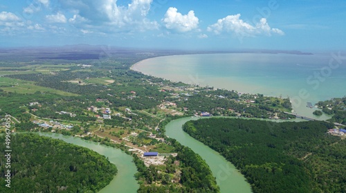 Aerial drone view of a river with mangrove swamp in Sedili Kecil, Johor, Malaysia photo