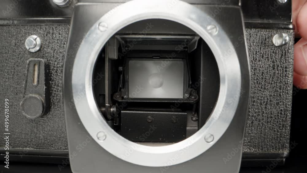 checking the work of an old film camera, close-up checking the work of an old film camera, close-up