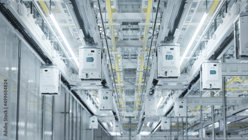 Fototapeta premium Shot of Automated Handling Material System Lines for Wafers Inside Advanced Semiconductor Production Fab Cleanroom